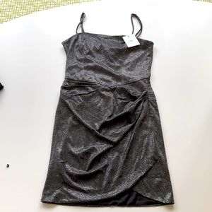 Adika. Black Sparkle. Mini. Adjustable straps. L.